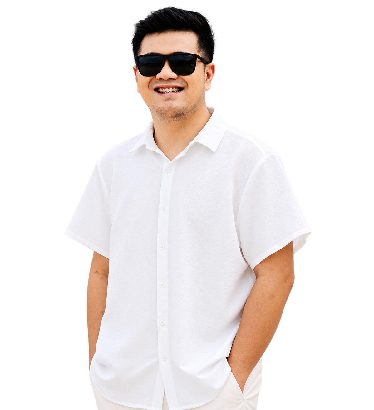 Carlo smiling in sunglasses and a white shirt